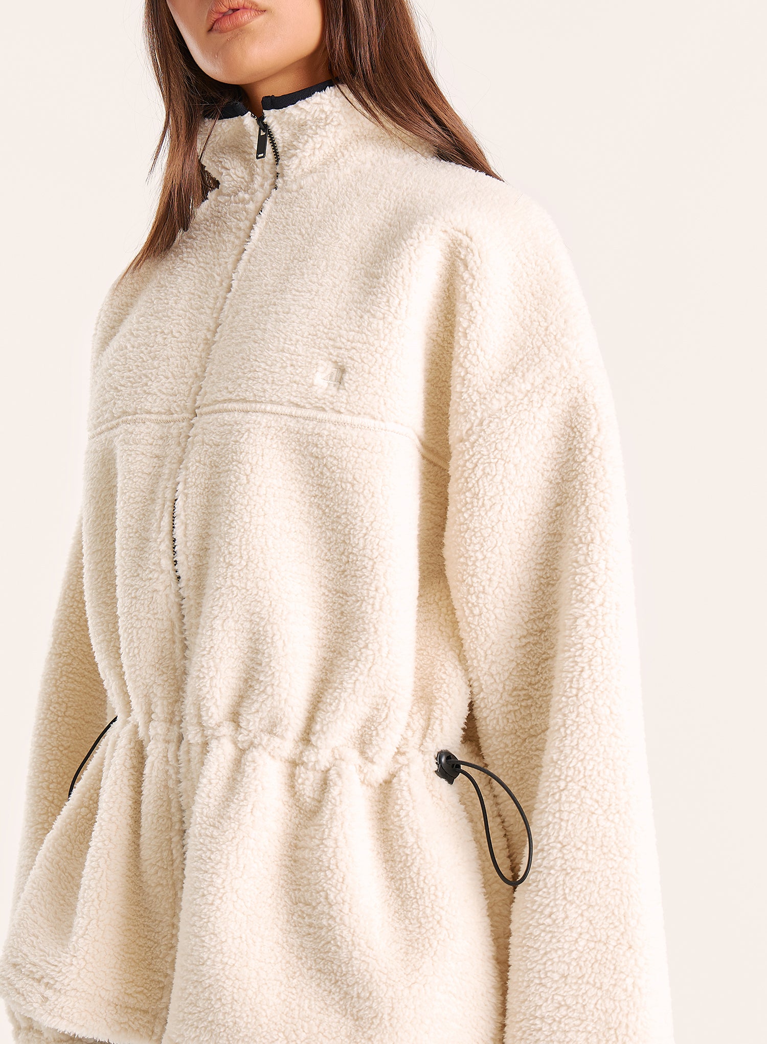 Cream Toggle Waisted Peplum Hem Fleece